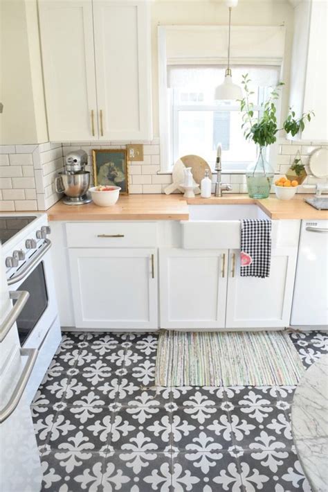 White marble kitchen floor tile. Kitchen Floors | Blue Tea Kitchens and Bathrooms