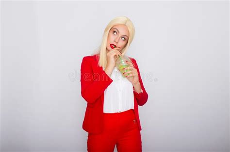Photo Of Adorable Blonde Businesswoman Smiling And Holding Cup Of