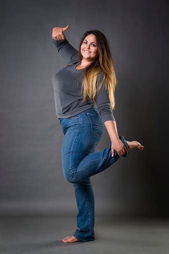 Young Beautiful Plus Size Model In Blue Jeans Xxl Woman Stockfoto Und