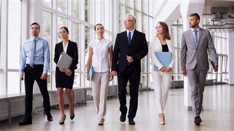 People Work And Corporate Concept Business Team With Folders Walking