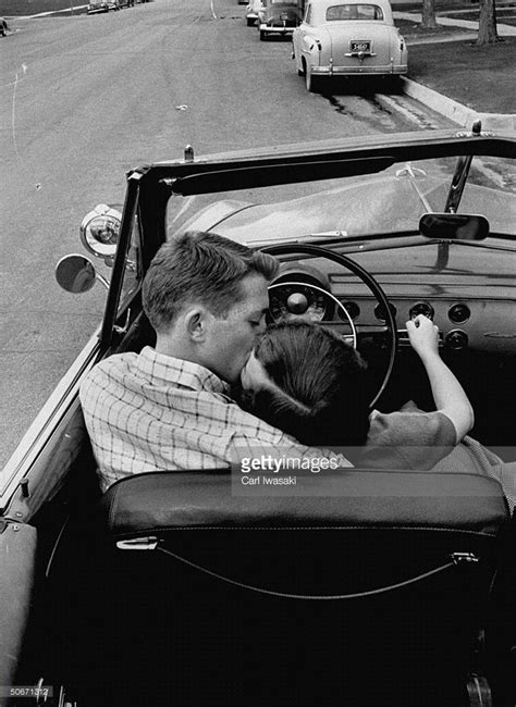 teenagers going steady kissing while on date 50s romance vintage romance vintage love