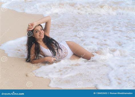 Sensual Pretty Girl In Swimsuit Lying On White Sand At Beach Stock Image Image Of Beachwear