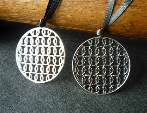Silver Flat Circular Pendant Inspired By Kates Fascination With