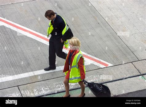 Cabin Crew Manchester Airport Arrivals Stock Photo Alamy