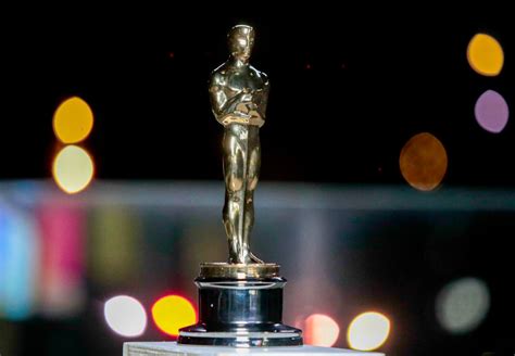 Who Is The Oscar Statue Modeled After And What Is It Holding