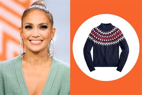 jennifer lopez paired a see through skirt with the cozy sweater we always see celebs wearing