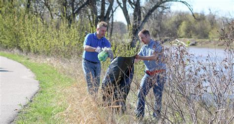 Grand Forks Rotary Club picks up trash along the Greenway - Grand Forks