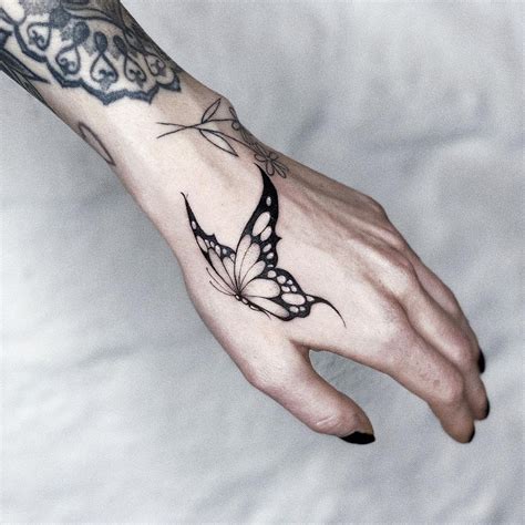 30 Awesome Butterfly Hand Tattoo Ideas For Men And Women In 2024