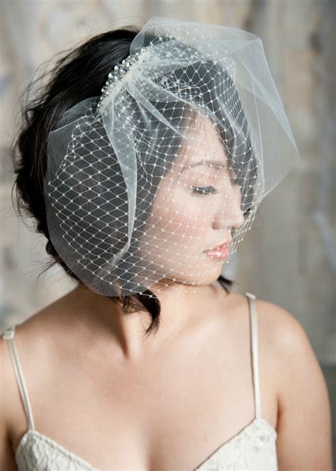 Hairstyles with veil, add a hair comb | check out some to die for. Hairstyles for the Birdcage Veils | WeddingElation