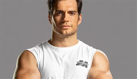 a picture of henry cavill wearing a suit showing his gigantic bulge has leaked