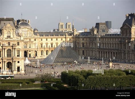 Aerial View Of Le Louvre And Its Pyramid Designed By Leoh Ming Pei With