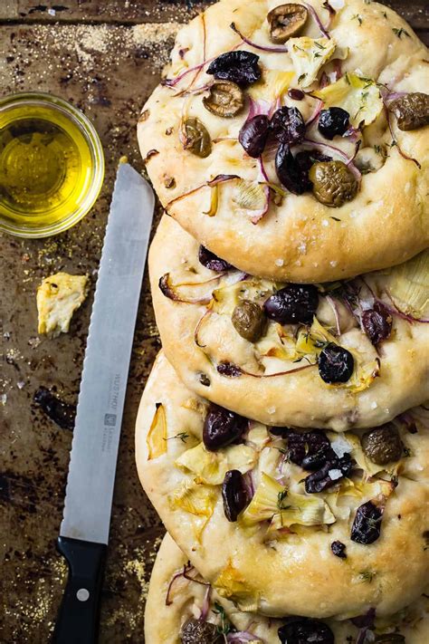 What's more, it requires no special equipment, no tricky shaping technique, and no scoring. Focaccia Bread with Olives and Artichokes - Foodness Gracious