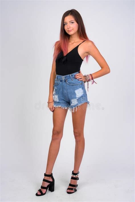 Full Body Shot Of Young Beautiful Rebellious Woman Standing Stock Image