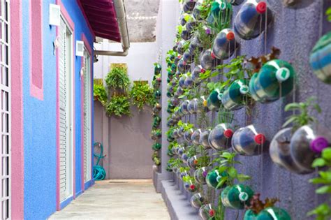 Urban Vertical Garden Built From Hundreds Of Recycled Soda