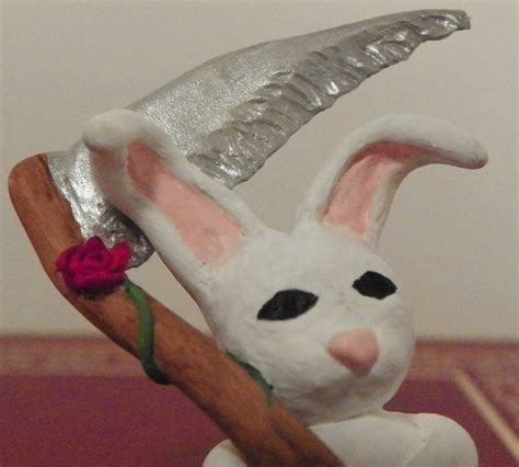Bunny With A Sythe · A Clay Rabbit · Art On Cut Out Keep · Version By