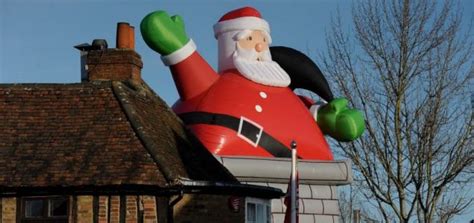 6' air blown inflatable mixed media beach snowman w/ hat and pail. Blow-ho-ho: Giant inflatable Santa rips tiles off pub roof ...