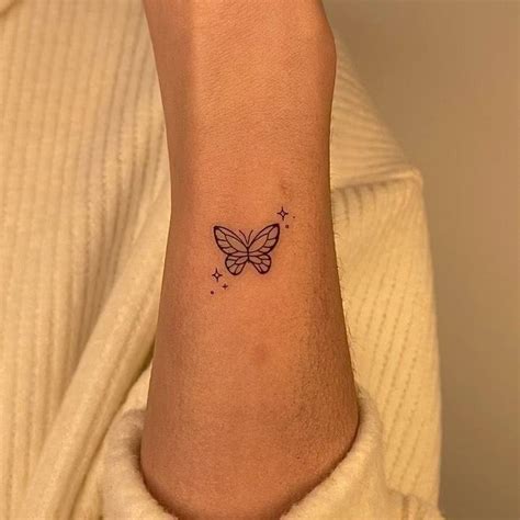 Fine Line Butterfly Tattoo On The Wrist