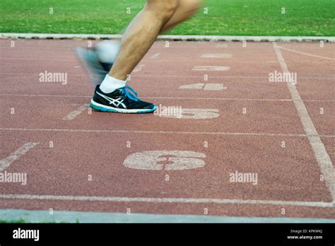 Runners Feet In Motion On Track Stock Photo Alamy