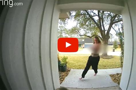 Watch Clumsy Porch Pirate Loses Her Top While Trying To Steal Package