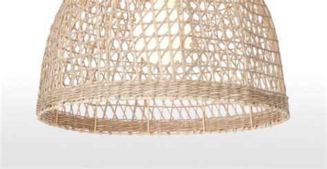 The simply body of this table lamp lets the material of the shade stand out. Henna Woven Lamp Shade, Natural Seagrass | MADE.com