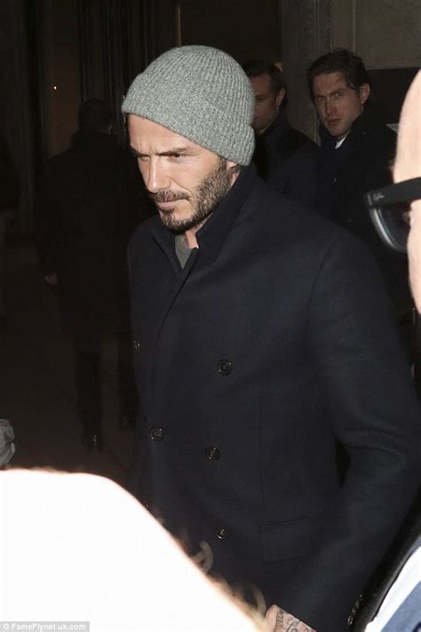 David Beckham Keeps It Casual In A Beanie And Pea Coat Daily Mail Online