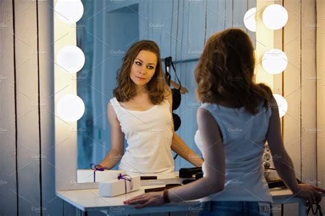 Beautiful Girl Looking In The Mirror High Quality People Images