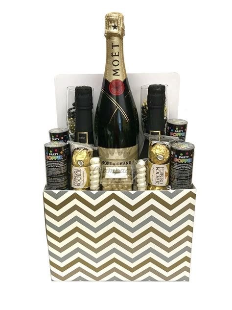 Send a toast to another year of life to someone you care about. New Years Champagne Gift Basket | Champagne gift baskets ...