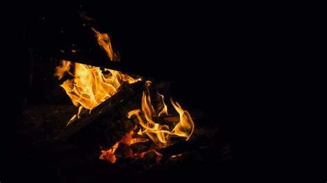 Download Wallpaper 2048x1152 Firewood Flame Bonfire Dark Ultrawide