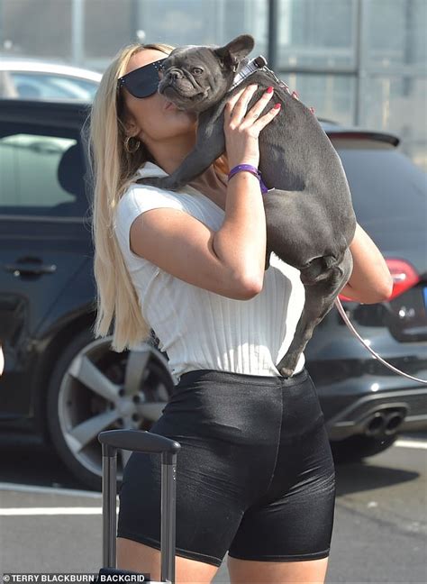 Chloe Ferry Showcases Her Curves In A Skintight White T Shirt And Skimpy Black Shorts Daily