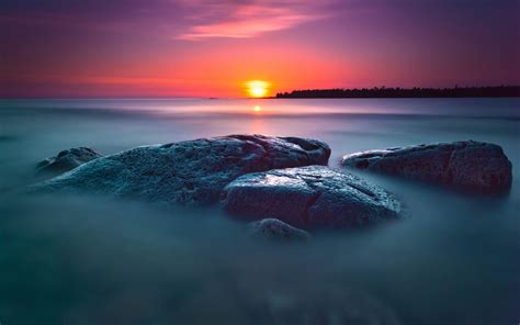 Gray Rock Formation Near Body Of Water At Sunset Hd Wallpaper