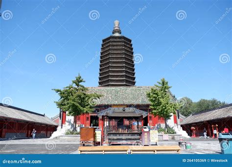 Low Angle Of The Millennium Old Tianning Temple In Beijing And People