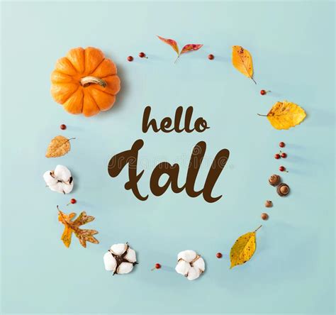 Hello Fall Message With Autumn Leaves And Orange Pumpkin Stock Image