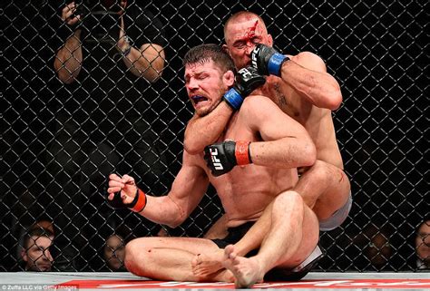 Georges St Pierre Submits Michael Bisping With Rear Naked Choke As The