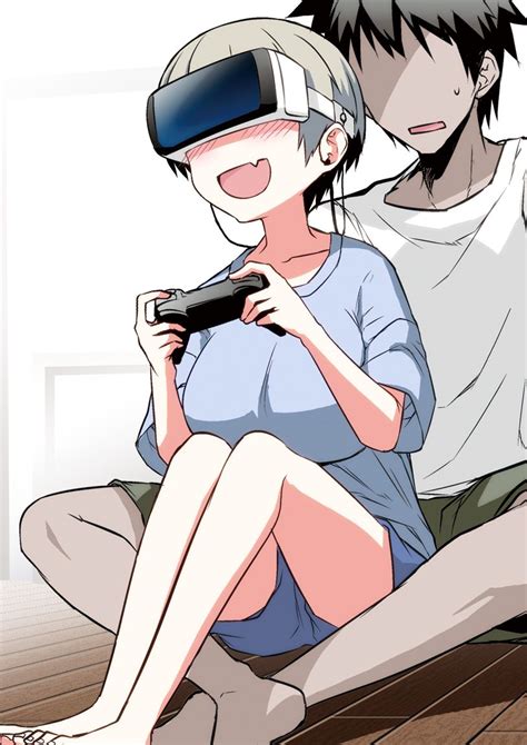 A Man And Woman Sitting On The Floor Playing With A Video Game Console