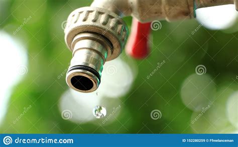 A Drop Of Pure Water Dripping From The Tap Stock Image Image Of