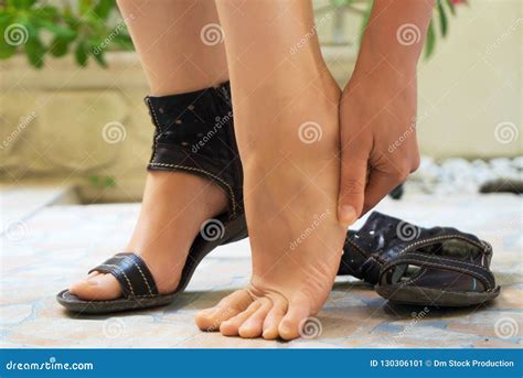 Woman Rubbing Her Feet Stock Image Image Of Person 130306101