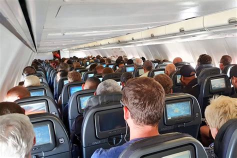 Passenger Shares Terrifying Image Of Packed Plane Despite Social Distancing Rules The Us Sun
