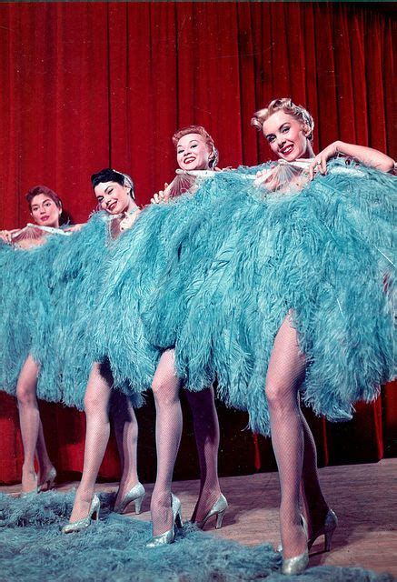 Photograph Of The Copa Girls Posing With Blue Ostrich Feather Fans Las