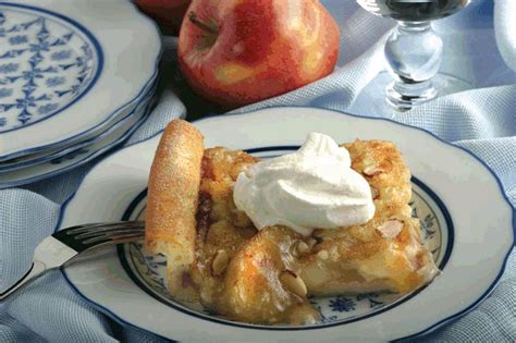 Arrange apple slices on warm crust.mix. Apple Kuchen