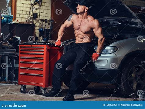 Shirtless Mechanic In A Garage Stock Photo Image Of Maintains Automobile