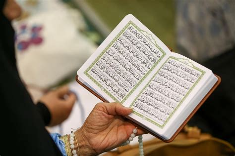 هل يجوز قراءة القرآن أثناء الدورة الشه