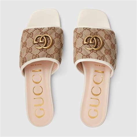 Shop The Womens Slide Sandal With Double G In Beige At Guccicom