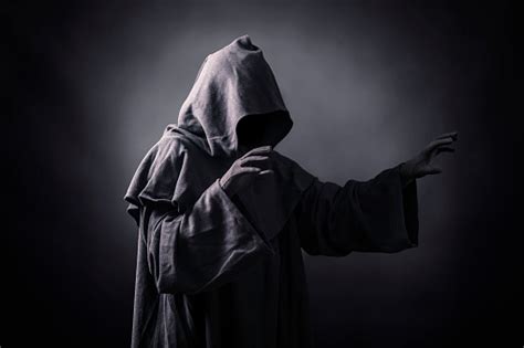 Scary Figure In Hooded Cloak Stock Photo Download Image Now Istock