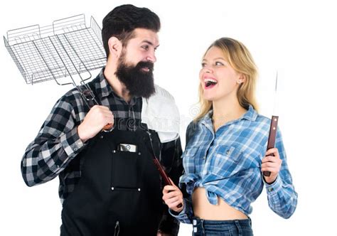 Tools For Roasting Meat Outdoors Picnic And Barbecue Man Bearded Hipster And Girl Ready For