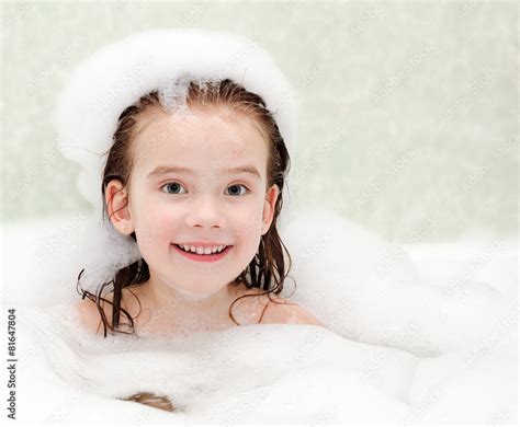 Smiling Little Girl Washing In Bath Stock Photo Adobe Stock