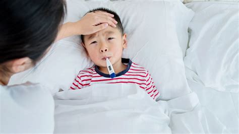 When Should A Sick Kid Stay Home Or Go To School Huffpost Parents