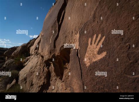 Native American Petroglyphs Etched Into The Steep Canyon Walls Along