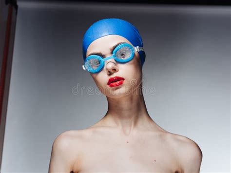 Sportswoman With Red Lips In Blue Swimming Cap And Glasses Naked Shoulders Cropped View Stock