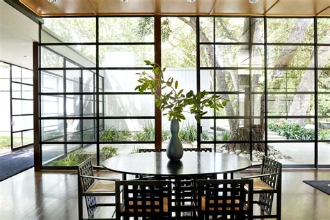 The Glass Wall Of Windows Lets In Plenty Of Natural Light Country