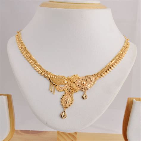 Gold Necklace With A Beautiful Floral Design Bridal Gold Jewellery